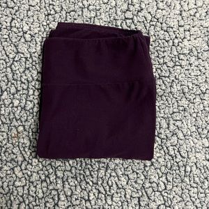 Purple LuLaRoe leggings that are one size and are very soft and stretchy
